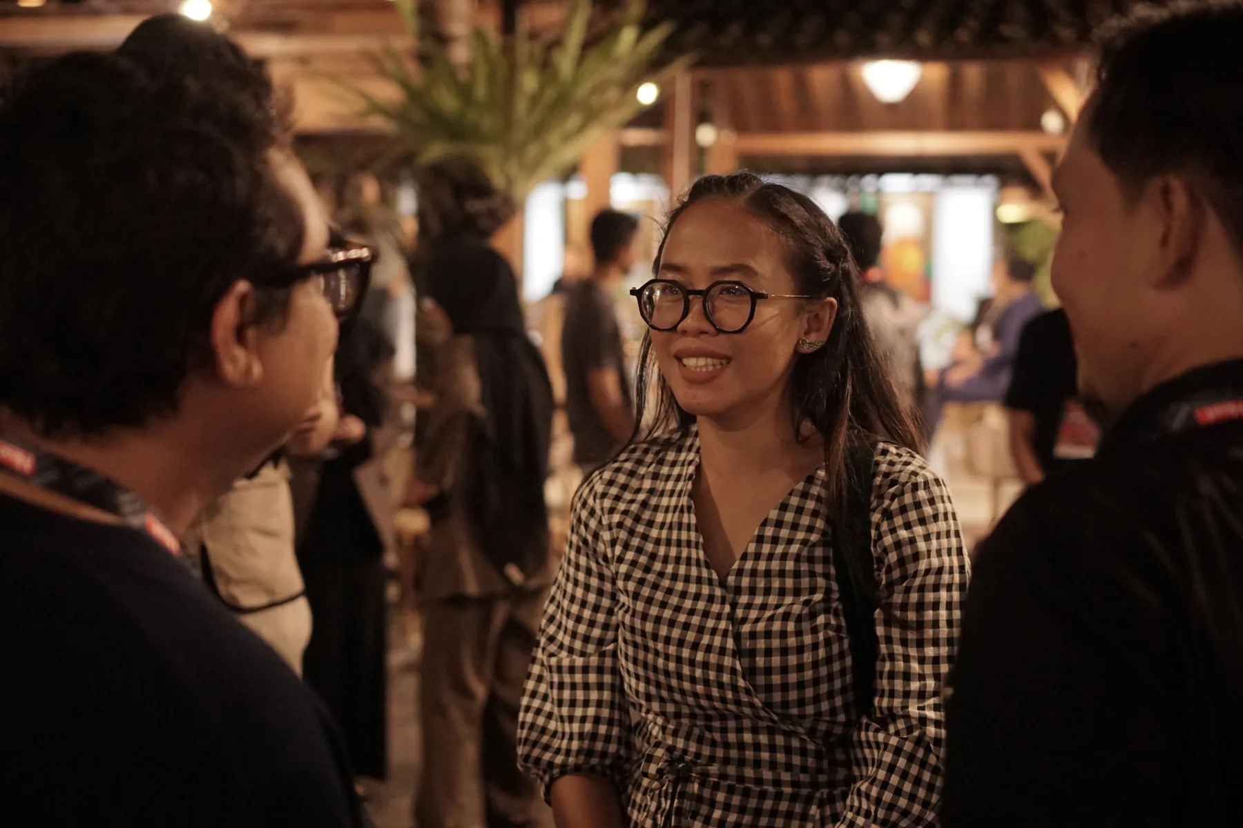 Two people in conversation at a networking evening